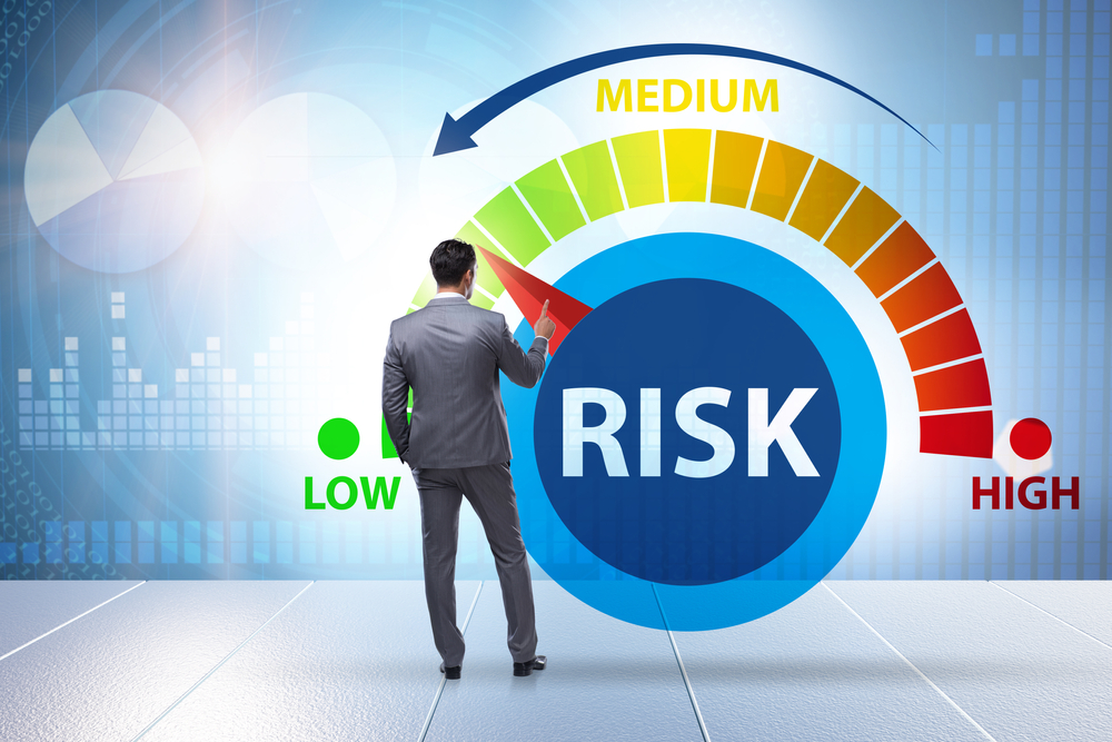 Businessman in risk metering and management concept.