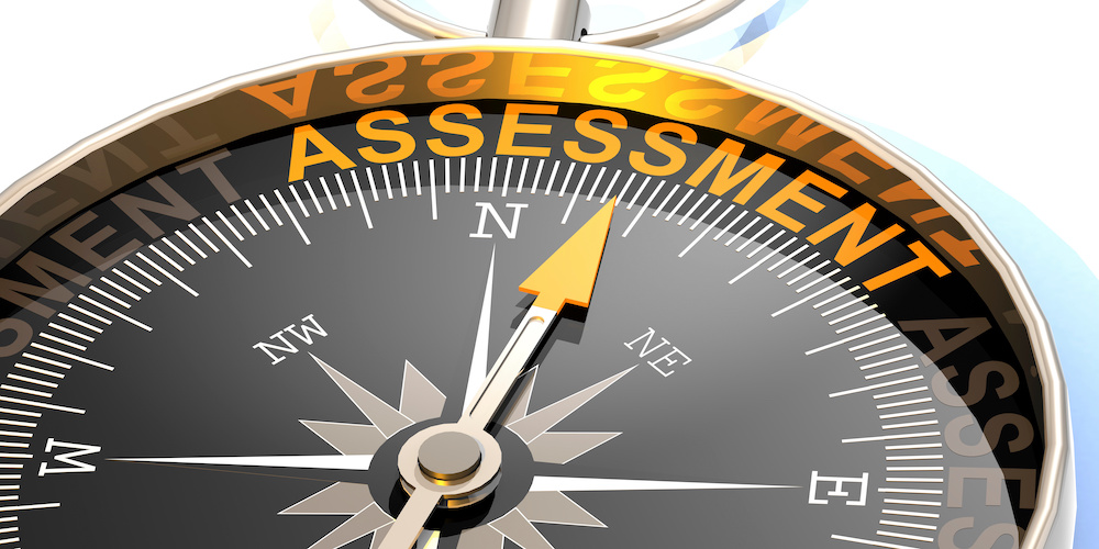 Compass needle pointing to word assessment, IT evaluation concept.