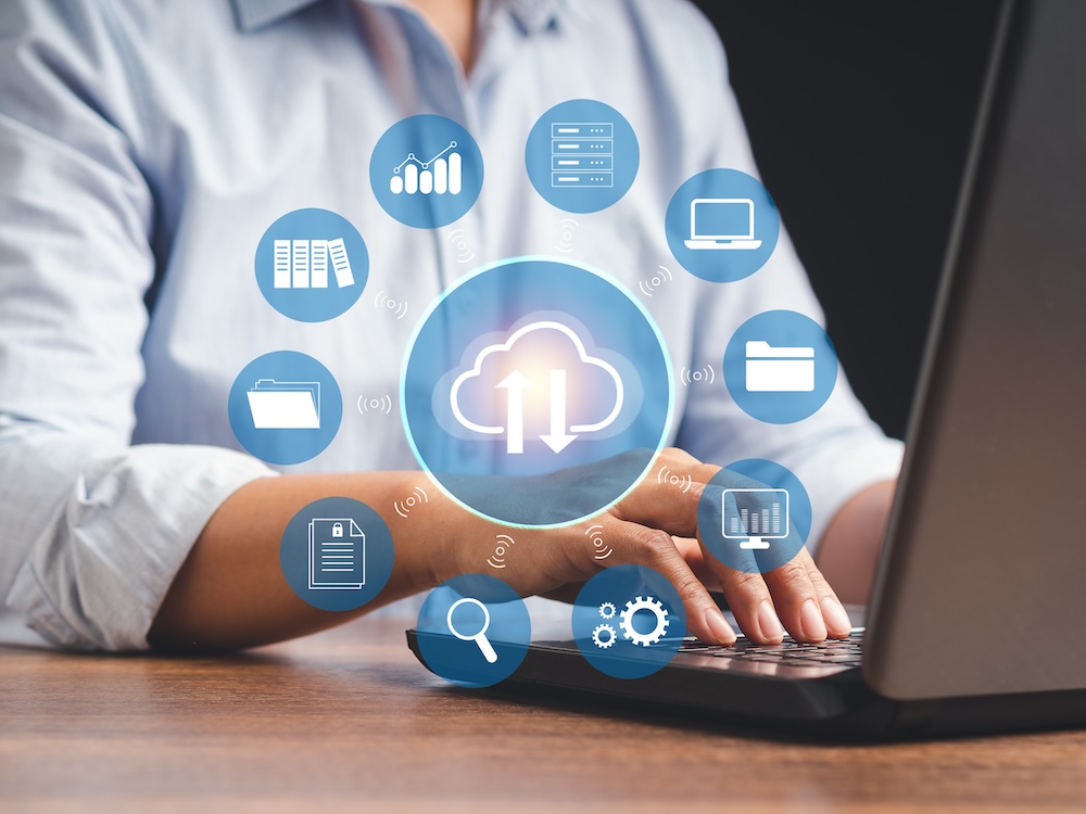 Businessman using a laptop login to the cloud computing. Network data storage technology. Connect devices to the cloud. Business and technology concept